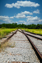 Fototapeta na wymiar Old Abandoned Railroad Tracks Into Nowhere