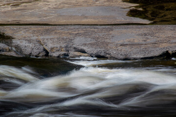 water flowing over rocks