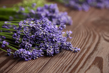 Romantic lavender flowers bouquet on wooden background