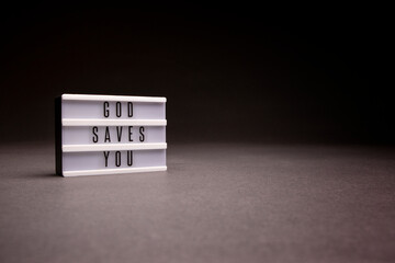 God Saves You light up message board with copy space.
