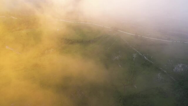 Sun Rays And Clouds Over The Lush Green Mountain In Racha, Georgia On An Early Morning - aerial