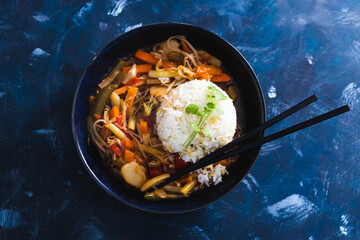 plant-based food, vegan sticky rice with stir fry vegetables in sweet and sour sauce