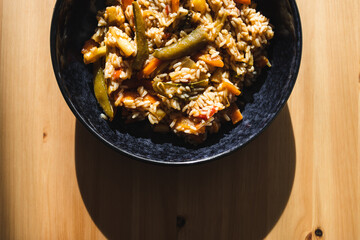 plant-based food, vegan fried rice with stir fry vegetables in sweet and sour sauce