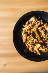 plant-based food, vegan fried rice with stir fry vegetables in sweet and sour sauce