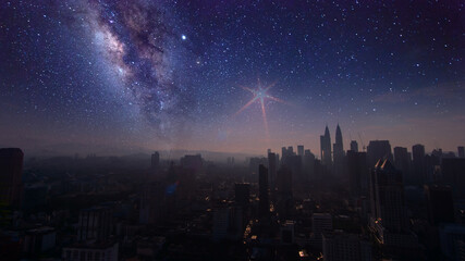 Fototapeta na wymiar Milky Way Galaxy rising in Kuala Lumpur City. Image contain Noise and Grain due to High ISO. Image also contain soft focus and blur due to Long Exposure and Wide Aperture. 