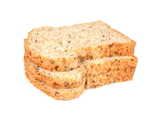 Whole grain sandwich bread slices, on white background.