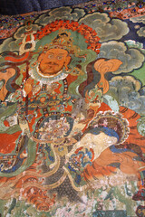 Yülkhorsung, Heavenly King of the North (yellow) painted on the wall of the Sera Monastery in Lhasa, Tibet, China