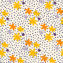 Yellow and orange daisy flowers seamless pattern. White background with dark dots.