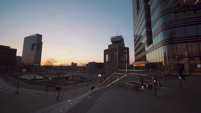 Sunset View Of Contemporary Buildings With A'dam Tower In NDSM Wharf, Amsterdam, Netherlands - medium wide shot