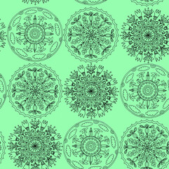 Cute hand drawn mandalas on green background in a seamless pattern for yoga design