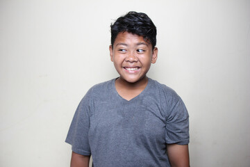 photos of various Asian boy facial expressions