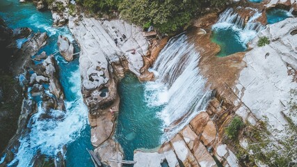 Aerial photos from Air Terjun Tanggedu in Sumba. Beautiful waterfalls with several natural pools. Indonesia.