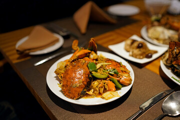 Stir-Fried Sea Crab with Curry Powder Sauce, Milk and Eggs. A popular Thai-Chinese seafood recipe.
