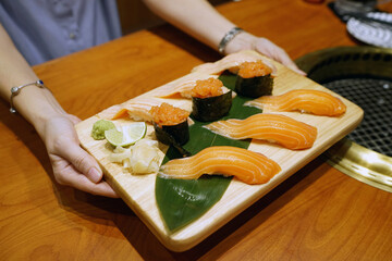 Salmon sushi Set-  Steamed rice topped with fresh salmon sliced, Japanese food style.