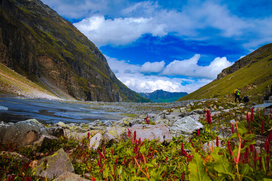 Mountain landscape with a lake and blue sky, Hamta Pass lies at an altitude of 4270 m on the Pir Panjal range in the Himalayas. It is a small corridor between Lahaul and Kullu valley, Himachal, India 