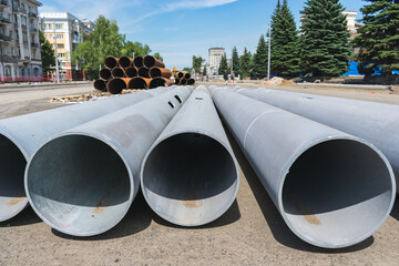 Installing new sewer pipes in place of old ones during road works
