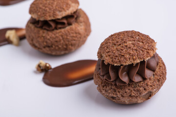 chocolate cupcake on white plate, close-up