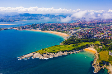 Naklejka na ściany i meble Scenic view from drone of coastal Spanish town of Santander on sunny summer day, Cantabria