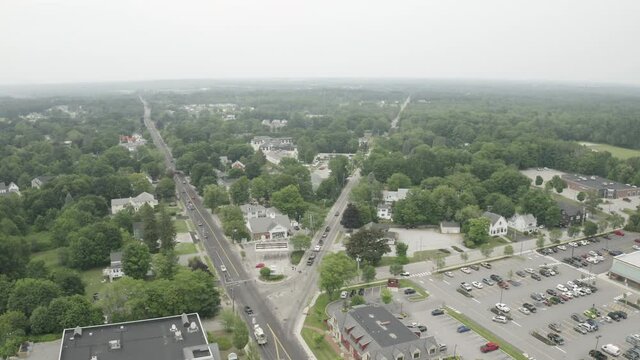 Aerial Fly Over Drone Footage over intersecting road in Gorham Downtown, Cumberland County in Maine, USA
