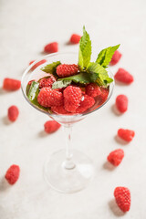 Raspberry martini cocktail. Selective focus. Shallow depth of field.