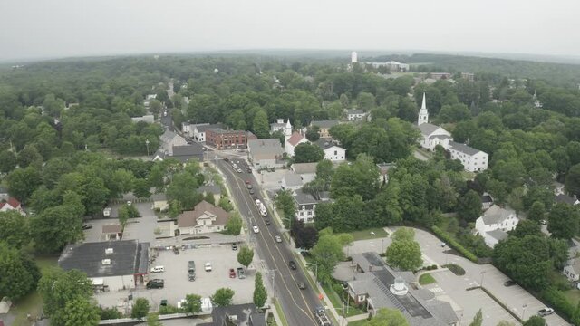 Aerial Fly Over Drone Footage looking West in Gorham Downtown, Cumberland County in Maine, USA