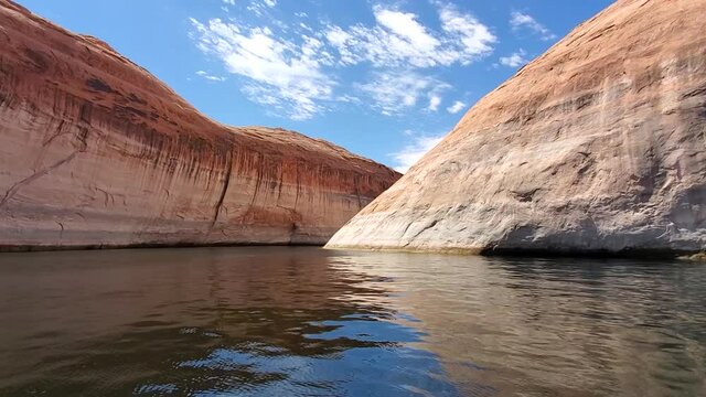  Lake Powell Utah rock cliffs and slot canyons water POV HD. Beautiful man made reservoir on Colorado River between Utah and Arizona. Vacation spot for hiking, boating and all outdoors recreation.