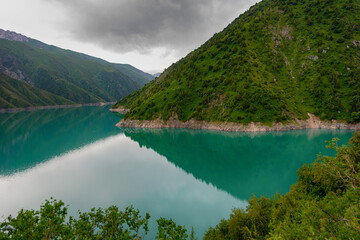 Beautiful mountain turquoise color lake Karasuu. Kyrgyzstan.
