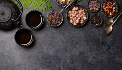 Various herbal tea, teapot and cup
