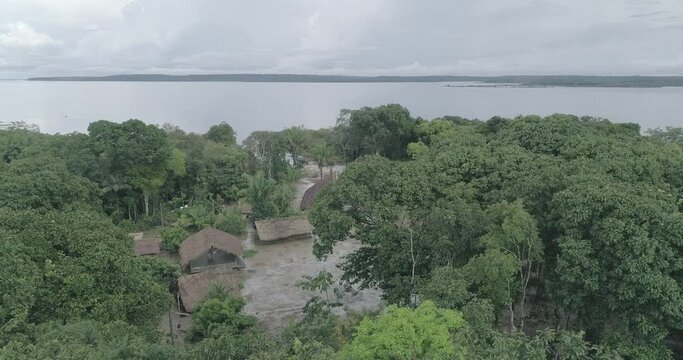 Indigenous tribe in the Amazon Jungle aerial shot
