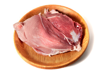 A plate of raw meat of pork on white background