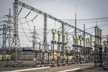 High voltage power lines and transmission towers. Modern electric power station.