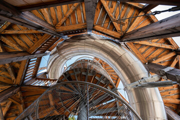 wood construction with a big pipe to slide