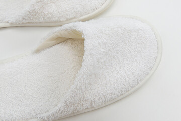 white terry slippers. footwear for hotels