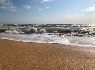 Seashore - Stock Image. Beautiful summer seascape. Sea waves, light breeze