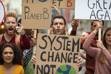 People with banners protest for climate change