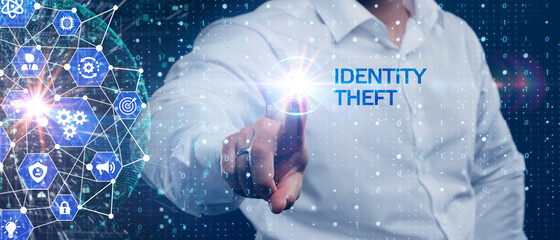 Business, Technology, Internet and network concept. Young businessman working on a virtual screen of the future and sees the inscription: identity theft