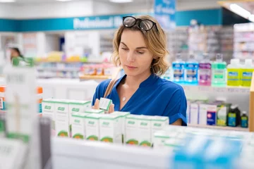 Aluminium Prints Pharmacy Woman choosing product in pharmacy