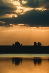 gorgeous sunset over the river and field