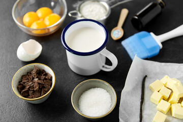 food, culinary and recipe concept - baking and cooking ingredients on table