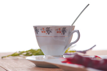 Tasty oriental sweets. Caucasian delicacy churchkhela - georgian nut treats. Served with a glass of tea and a tea pot.