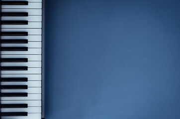 Piano keys on blue background