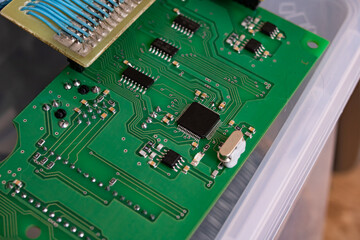 Green PCB with tracks closeup, macro photo