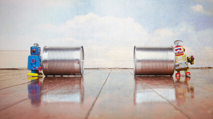 two little bots on tin can phones 