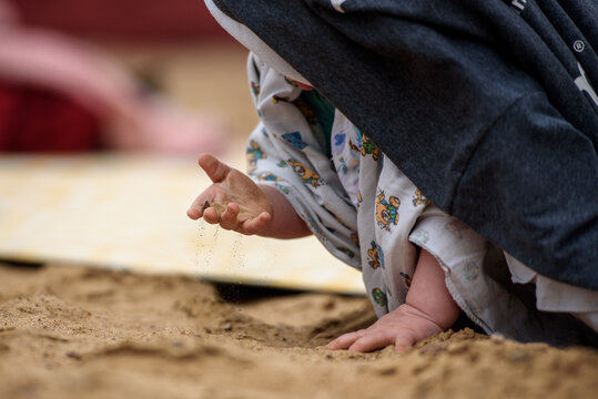Children's palm and sand-the concept of the child's development of the surrounding world.
