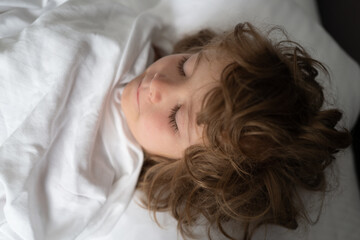 Obraz na płótnie Canvas Adorable little kids sleeping in bed. Good morning.