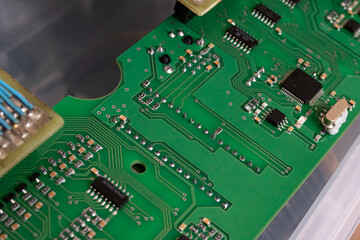 Green PCB with tracks closeup, macro photo
