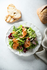 Healthy green salad with smoked salmon