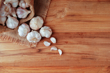 Garlic Cloves and Bulb on the wooden table.Healthy food concept.