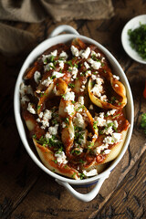 Homemade pasta bake with tomato sauce and cheese