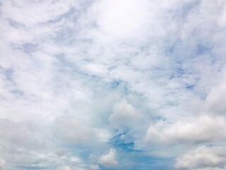 A bright white cloud in the blue sky